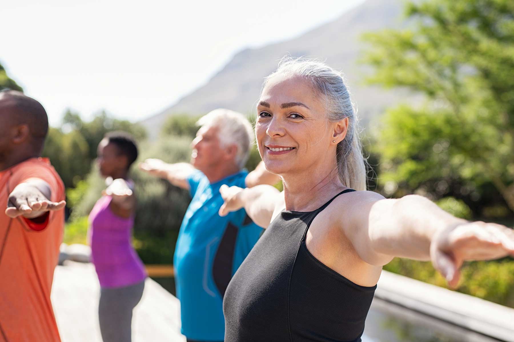 Woman exercising with a group.